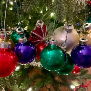 Cluttered ornaments on a Christmas tree